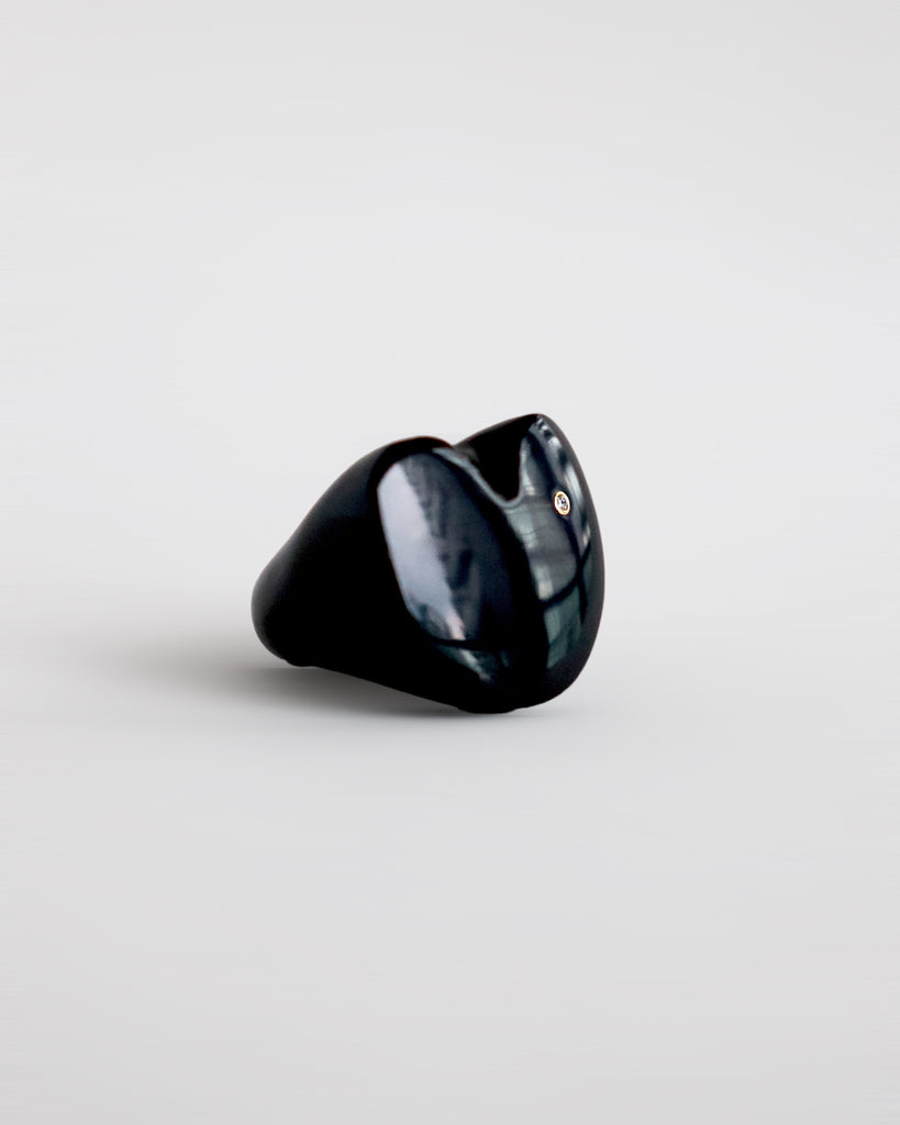 Onyx Hoya ring with a diamond