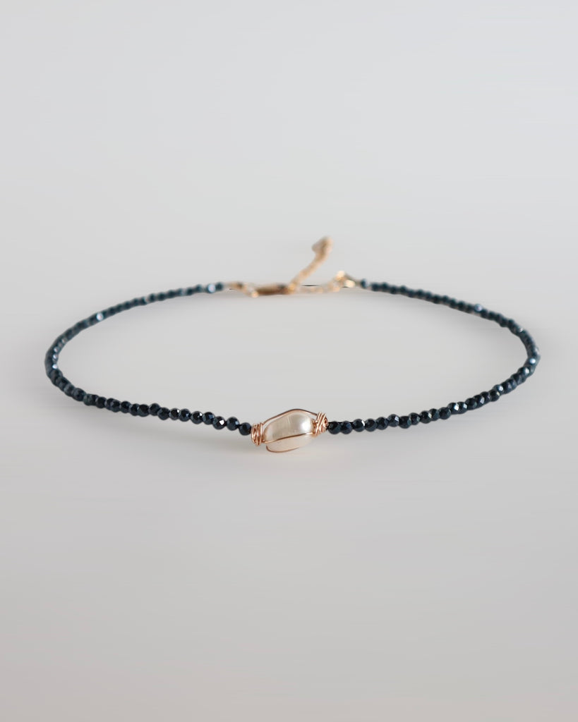 Diamond cut necklace with pearl