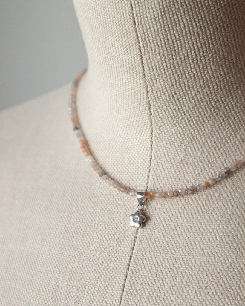 Diamond cut flower necklace