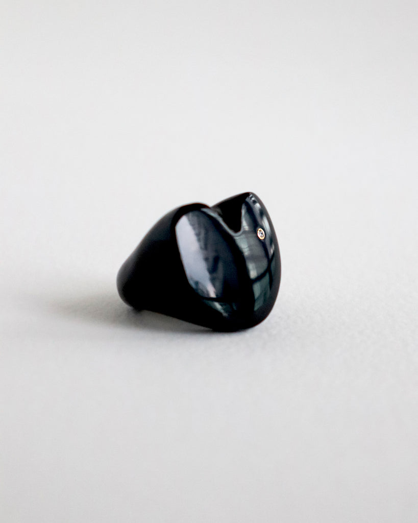 Onyx Hoya ring with a diamond