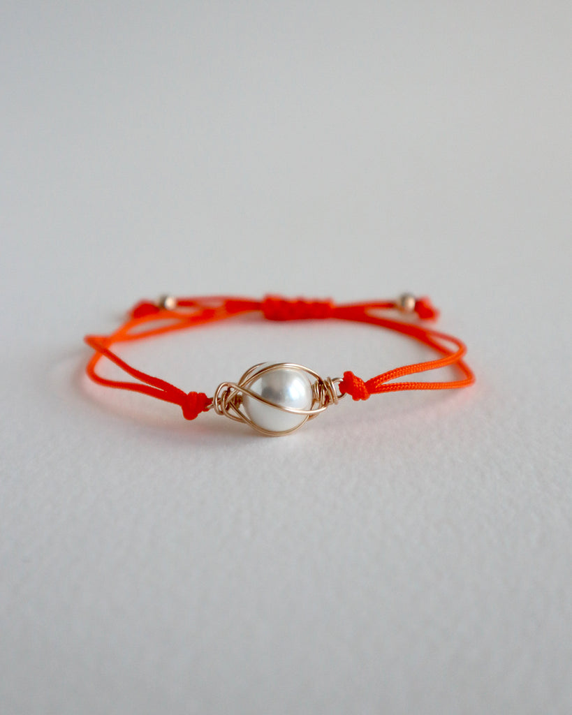 Orange Wrapped Pearl Cord Bracelet